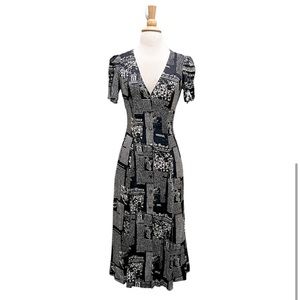 Reformation Lochlin Dress in Zine Newsprint Size 2, short sleeve midi
